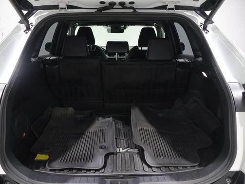Wind Chill Pearl/Midnight Black Metallic 2024 Toyota RAV4 Hybrid SE