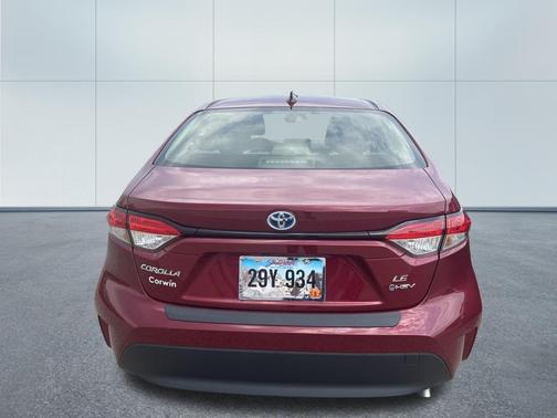 Ruby Flare Pearl 2025 Toyota Corolla Hybrid LE
