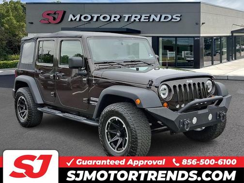 Rugged Brown Pearlcoat 2013 Jeep Wrangler Unlimited Sport
