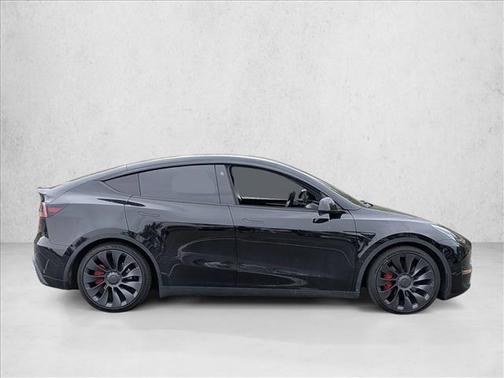 Solid Black 2024 Tesla Model Y Performance Dual Motor All-Wheel Drive