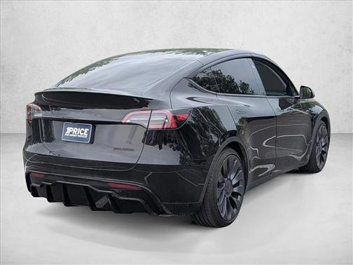 Solid Black 2024 Tesla Model Y Performance Dual Motor All-Wheel Drive