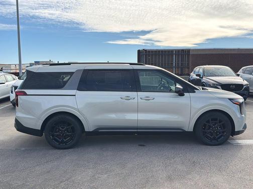 Ivory Silver 2026 Kia Carnival SX Prestige