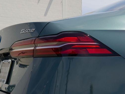 Green Metallic 2026 BMW 550e xDrive