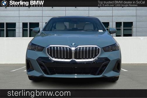 Green Metallic 2026 BMW 550e xDrive