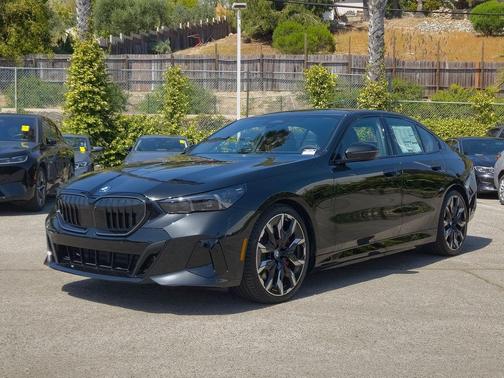 Black Sapphire Metallic 2026 BMW 550e xDrive