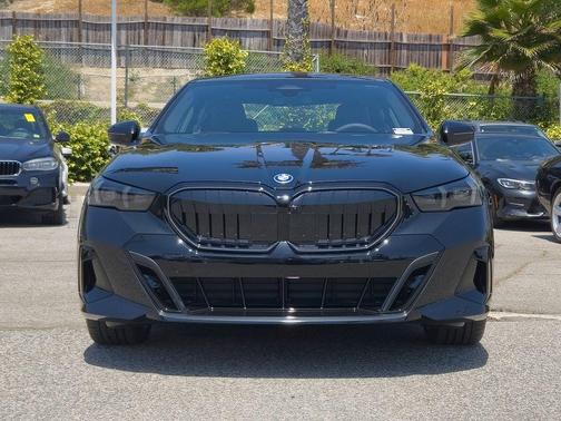 Black Sapphire Metallic 2026 BMW 550e xDrive