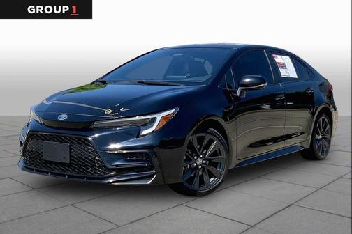 Midnight Black Metallic 2024 Toyota Corolla Hybrid SE