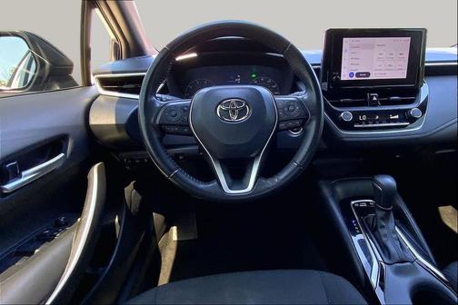 Midnight Black Metallic 2024 Toyota Corolla Hybrid SE