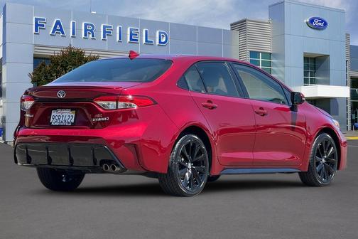 Ruby Flare Pearl 2023 Toyota Corolla Hybrid SE
