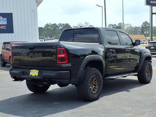 Diamond Black Crystal Pearlcoat 2026 RAM 1500 RHO Crew Cab 4x4 5'7' Box