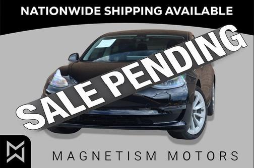 Solid Black 2023 Tesla Model 3 Standard Range Plus