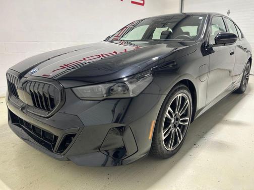 Black Sapphire Metallic 2026 BMW 550e xDrive