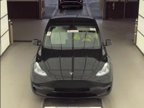 Solid Black 2023 Tesla Model Y Performance Dual Motor All-Wheel Drive