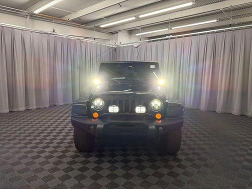 Black Clearcoat 2016 Jeep Wrangler Unlimited Sahara