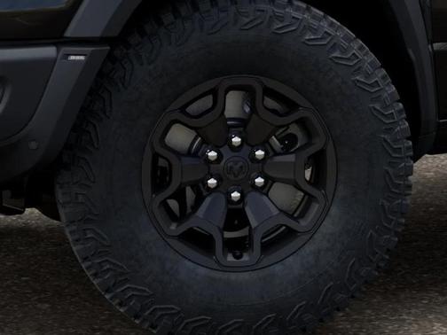 Diamond Black Crystal Pearlcoat 2026 RAM 1500 RHO Crew Cab 4x4 5'7' Box