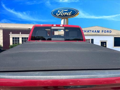 Red 2013 RAM 1500 SLT
