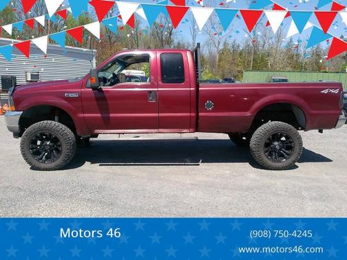 Dark Toreador Red Clearcoat/Silver Clearcoat Metallic 2004 Ford F-250 XLT SuperCab