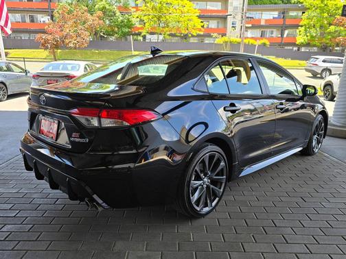 Midnight Black Metallic 2024 Toyota Corolla Hybrid SE
