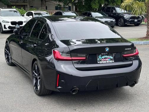Black Sapphire Metallic 2024 BMW 330 330i Sedan