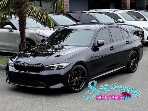 Black Sapphire Metallic 2024 BMW 330 330i Sedan