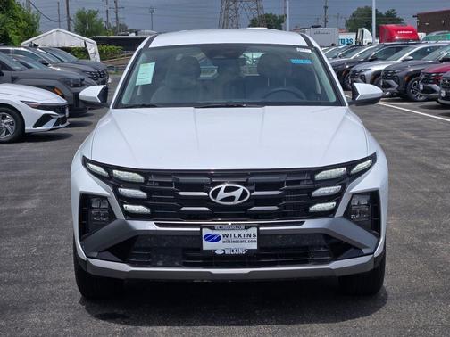 Creamy White Pearl 2026 Hyundai TUCSON Hybrid Blue SE