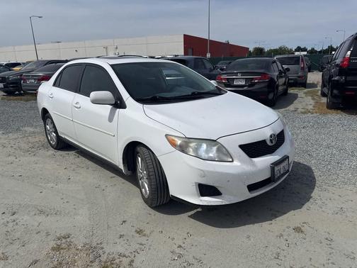 Super White 2009 Toyota Corolla XLE