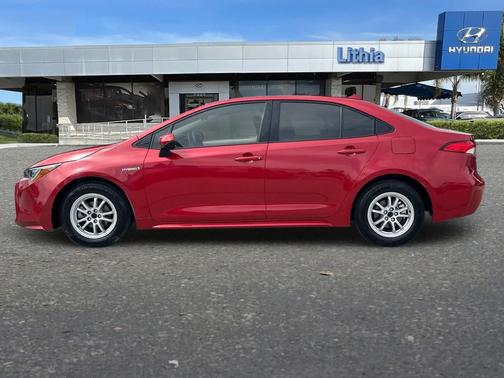 Barcelona Red Metallic 2021 Toyota Corolla Hybrid SE