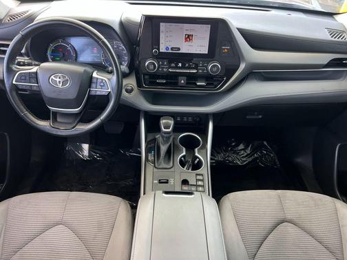 Midnight Black Metallic 2023 Toyota Highlander Hybrid LE