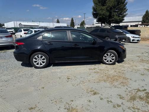 Midnight Black Metallic 2025 Toyota Corolla LE