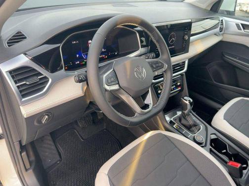 Pure White exterior 2026 Volkswagen Taos SE