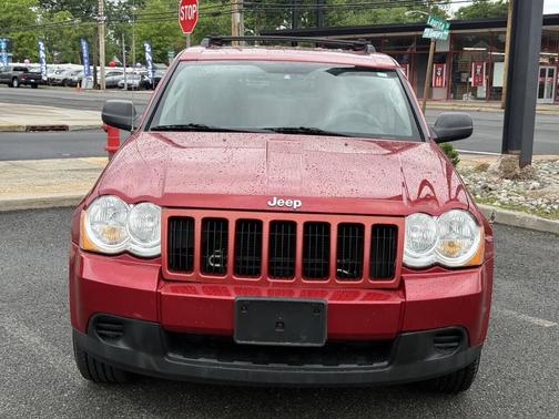 Red 2009 Jeep Grand Cherokee Laredo