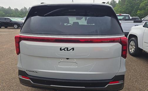 Ivory Silver 2025 Kia Carnival SX