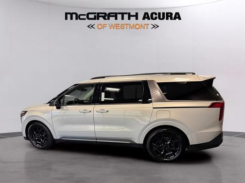 Ivory Silver 2025 Kia Carnival SX