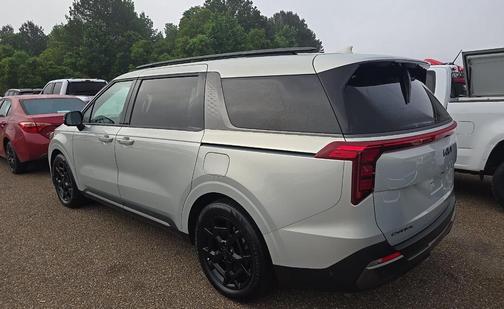 Ivory Silver 2025 Kia Carnival SX