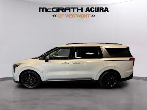 Ivory Silver 2025 Kia Carnival SX