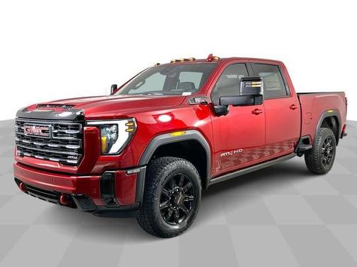 Volcanic Red Tintcoat 2026 GMC Sierra 2500 AT4