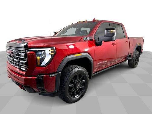 Volcanic Red Tintcoat 2026 GMC Sierra 2500 AT4