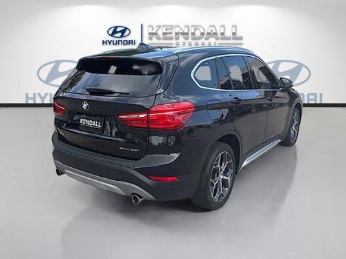 Black Sapphire Metallic 2018 BMW X1 sDrive28i