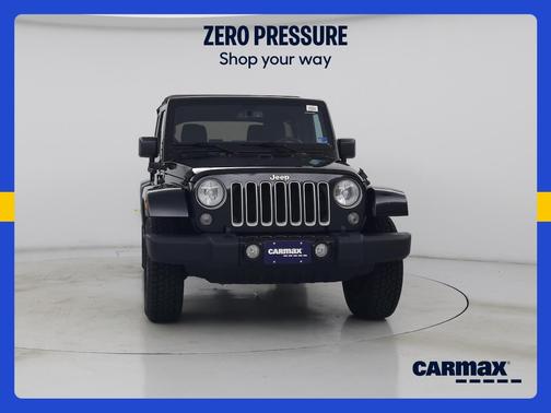 Black 2016 Jeep Wrangler Unlimited Sahara