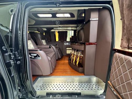 Black 2010 Ford E350 Super Duty XLT