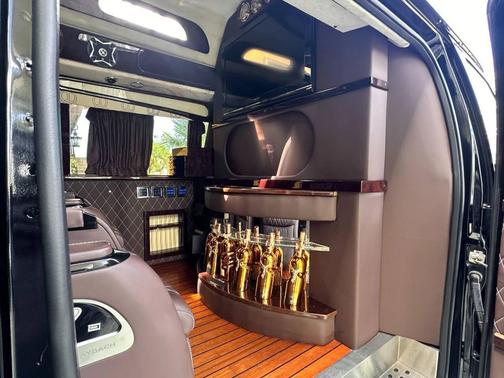 Black 2010 Ford E350 Super Duty XLT