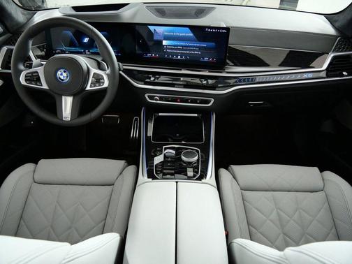 Green Metallic 2026 BMW X5 PHEV xDrive50e