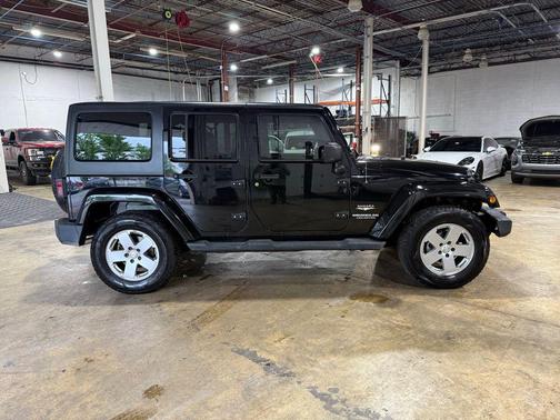 Black Clearcoat 2011 Jeep Wrangler Unlimited Sahara
