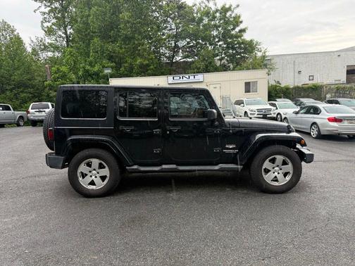 Black Clearcoat 2011 Jeep Wrangler Unlimited Sahara
