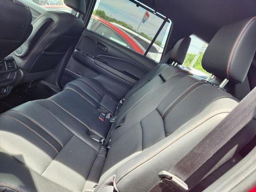 Red 2023 Honda Passport TrailSport