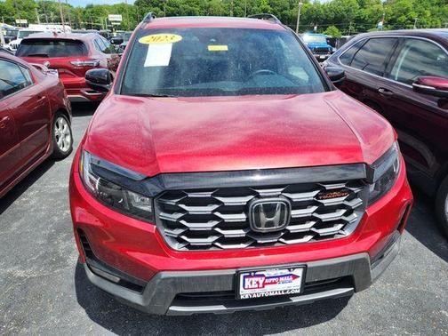 Red 2023 Honda Passport TrailSport
