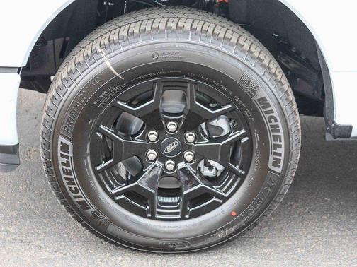 White Metallic 2025 Ford F-150 Lightning XLT