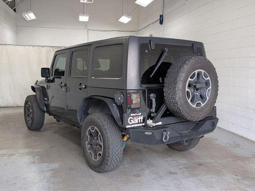 Black 2013 Jeep Wrangler Unlimited Sport