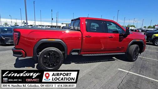 Volcanic Red Tintcoat 2026 GMC Sierra 2500 AT4
