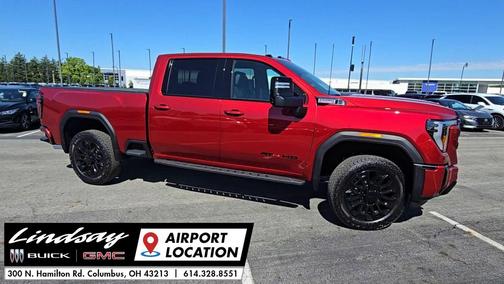 Volcanic Red Tintcoat 2026 GMC Sierra 2500 AT4